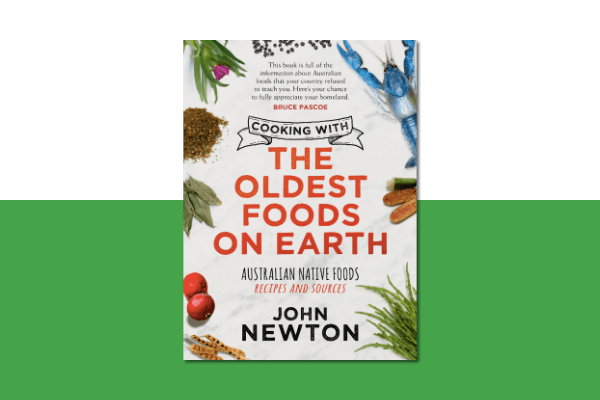 Cooking with the Oldest Foods on Earth book on green rectabgle